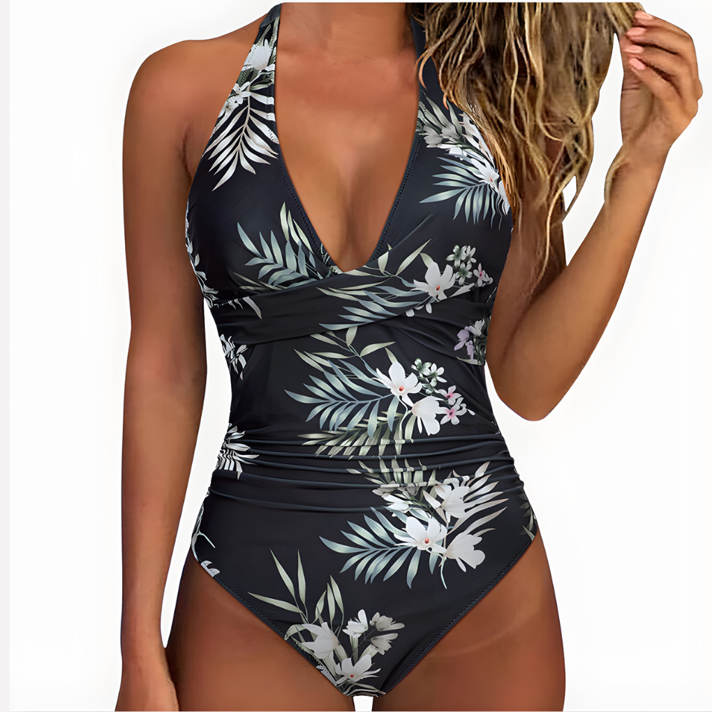 Figuurcorrigerend damesbadpak met elegante plooien, ideaal voor een zelfverzekerde look in de zomer.