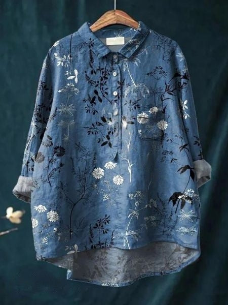 Vrouwenblouse met bloemenprint, knoopsluiting en lange mouwen. Geschikt voor zowel kantoor als vrije tijd.