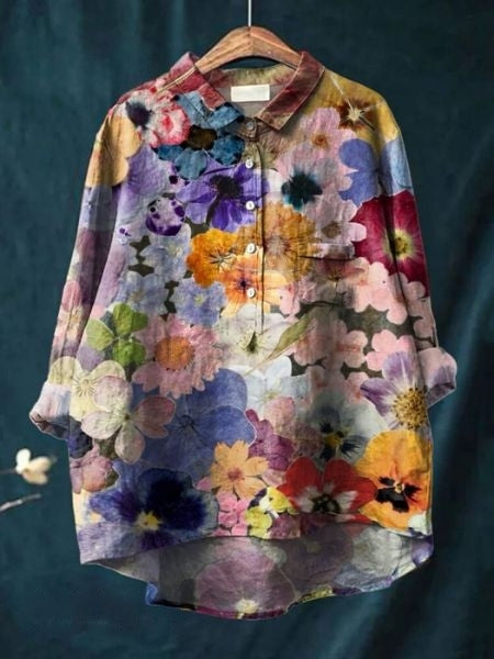 Dameskleding: elegante blouse met bloemenprint, knoopsluiting en lange mouwen. Veelzijdig en trendy.