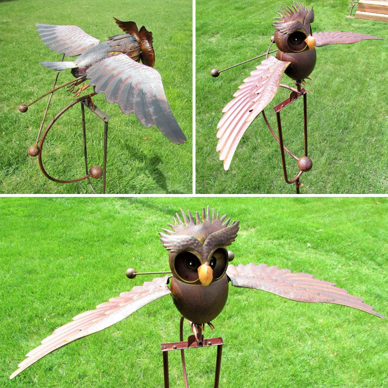 Decoratieve tuinkunst vogel windmolen, geïnspireerd op adelaar en uil, gemaakt van metaal voor terras of tuin.