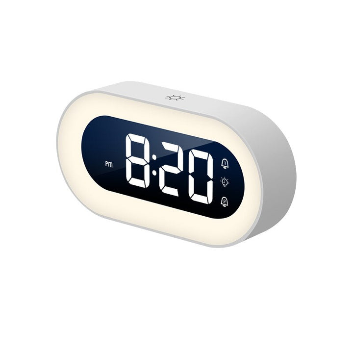 Compacte digitale wekker met ingebouwd nachtlampje, diverse geluiden en duidelijke tijdsaanduiding.