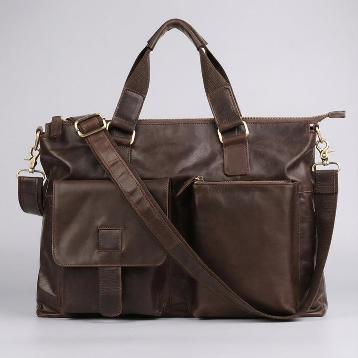 Unisex bruine vintage aktetas/laptoptas. Een professionele werktas en schoudertas voor kantoor en zakenreizen.
