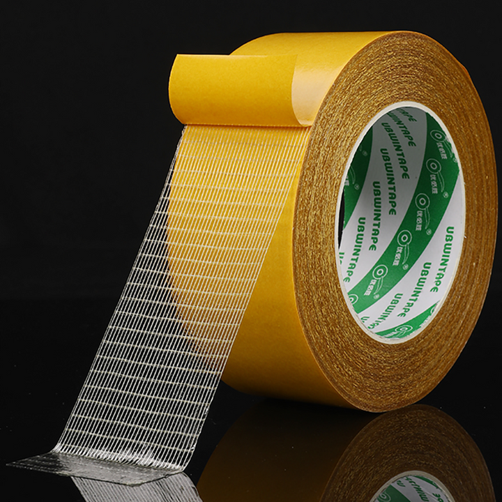 Dubbelzijdig zwaargewicht reparatietape, robuust, voor sterke hechting op tapijten en decoraties, waterbestendig, hoge kleefkracht.