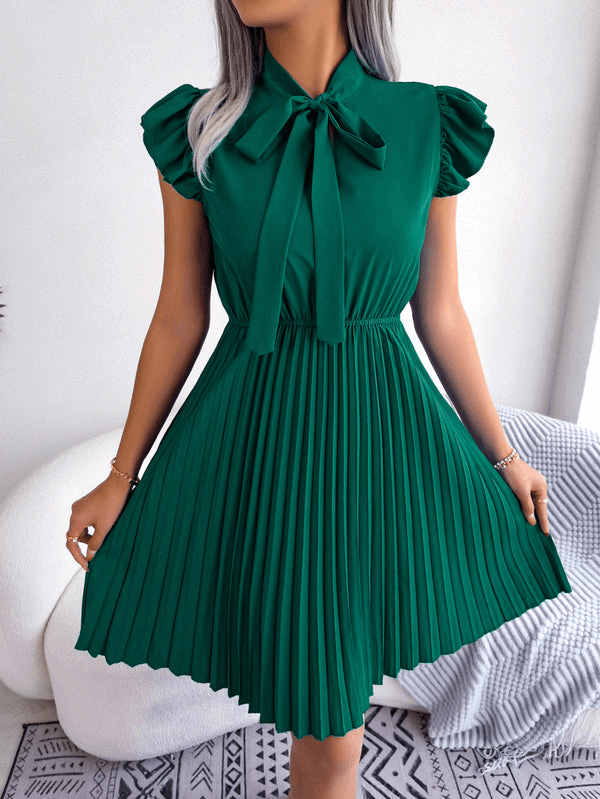 Elegant damesplisséjurk met strik