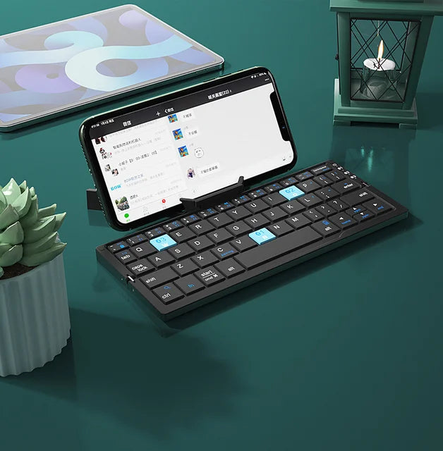 Draadloos opvouwbaar toetsenbord voor optimale productiviteit onderweg; compact en universeel, perfect voor tablets.