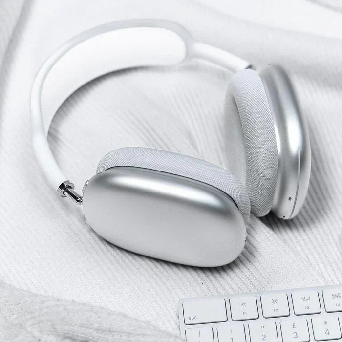 Draadloze roze koptelefoon met ergonomisch ontwerp, biedt superieur geluid en moderne ruisonderdrukkingstechnologie.