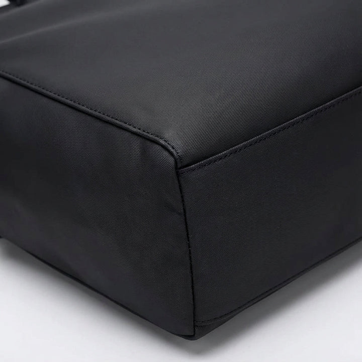 Duurzame DryCarrier waterafstotende schoudertas, unisex, geschikt als aktetas of schooltas voor laptops.