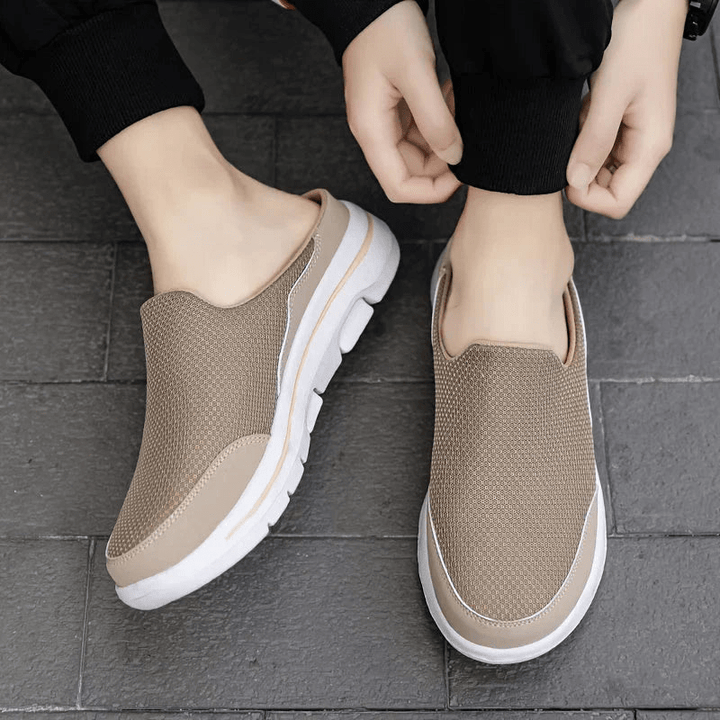 Elegante, ademende heren pantoffels in blauw, bruin, rood en zwart met ergonomisch ontwerp en antislipzool.