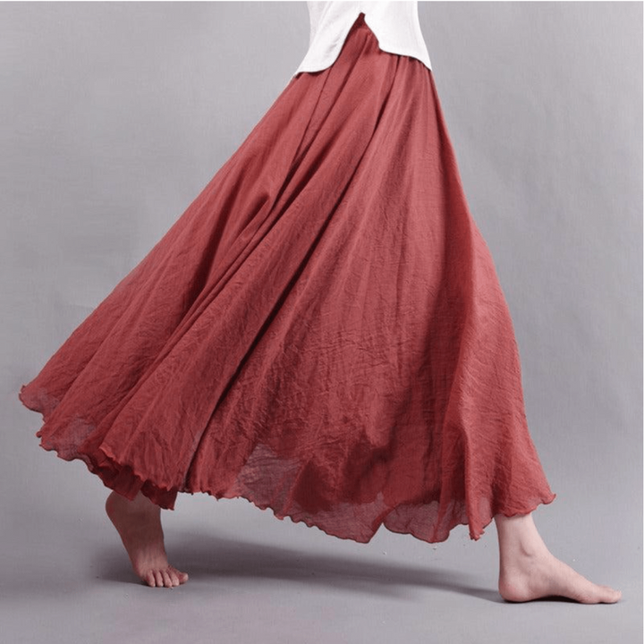 Modieuze dames maxi rok in bohemian stijl, vloeiend vallend, elegant en geschikt voor diverse zomerse gelegenheden.
