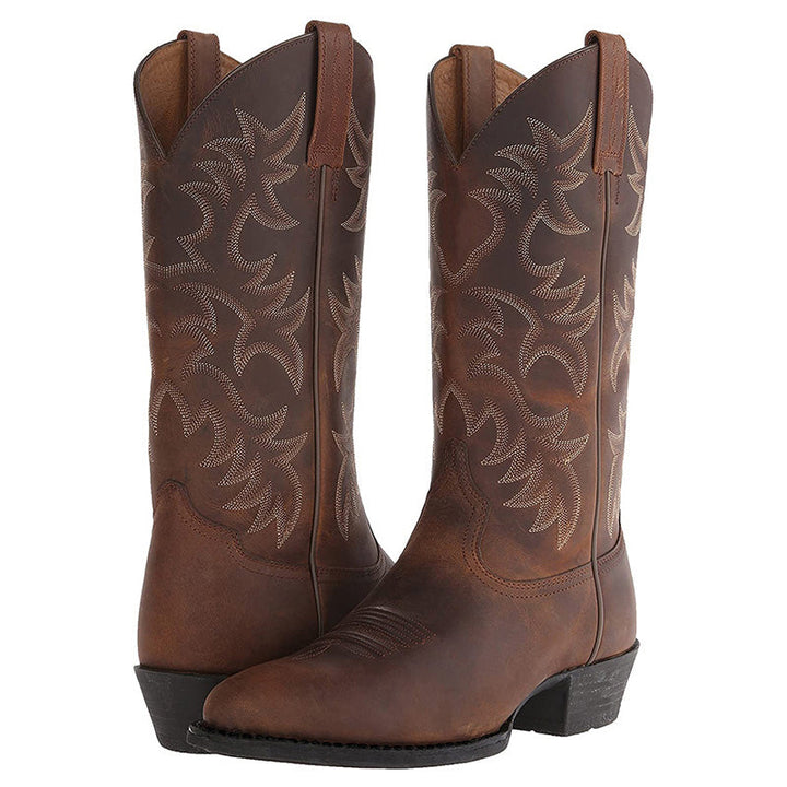 Stijlvolle heren cowboylaarzen van kwaliteitsleer met puntige neus en opvallende stiksels, perfect voor diverse gelegenheden.