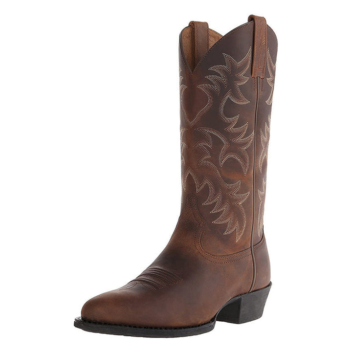 Stijlvolle heren cowboylaarzen van kwaliteitsleer met puntige neus en opvallende stiksels, perfect voor diverse gelegenheden.