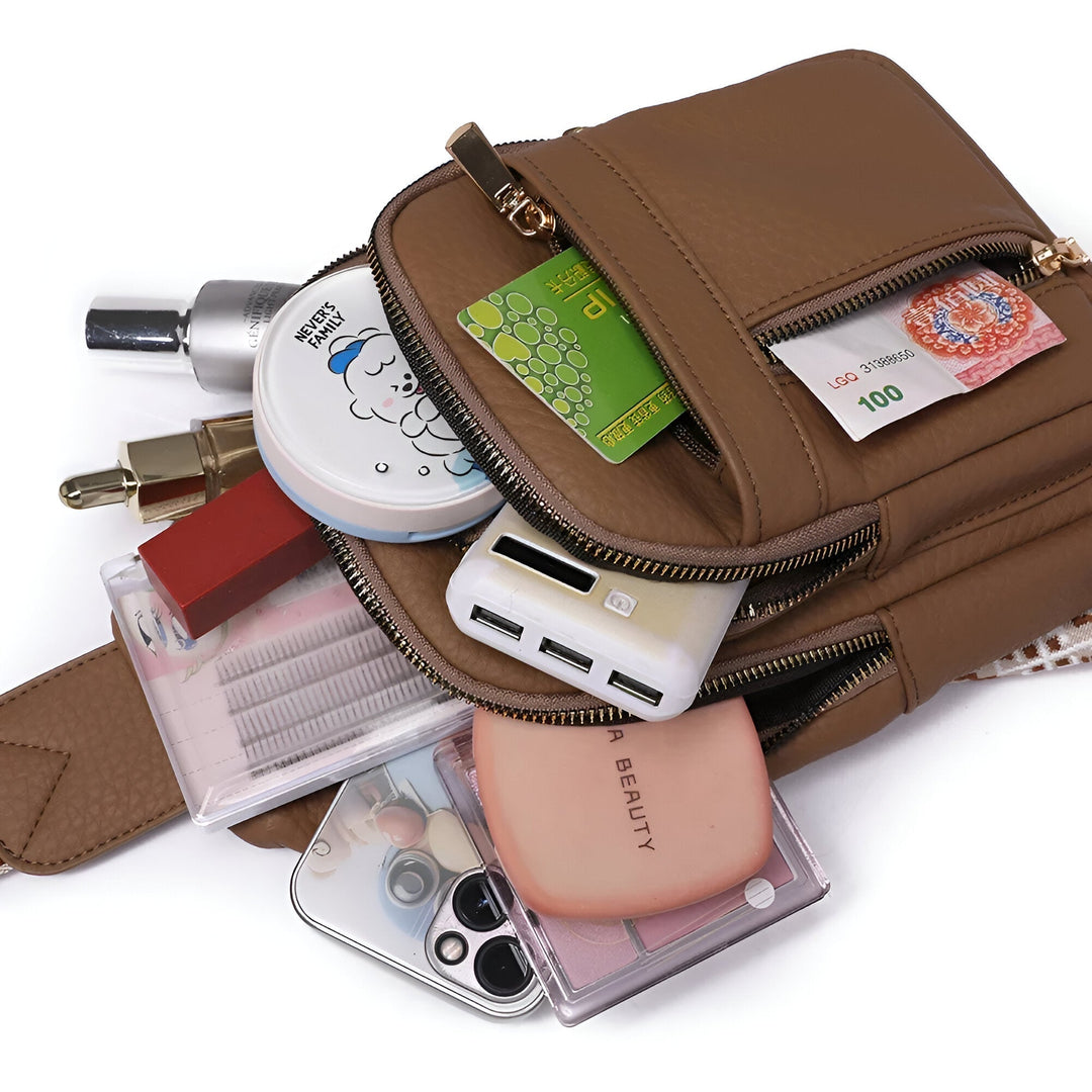Elegante dames anti-diefstal crossbody tas, veelzijdig en veilig, met meerdere binnenvakken en waterbestendig materiaal.