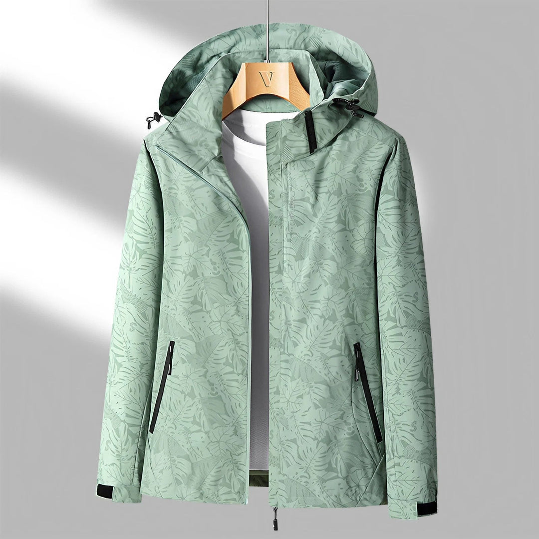 Elegante dames capuchonjas, waterdicht, winddicht, modern ontwerp, ideaal voor regenachtig weer, stijlvolle buitenkleding.