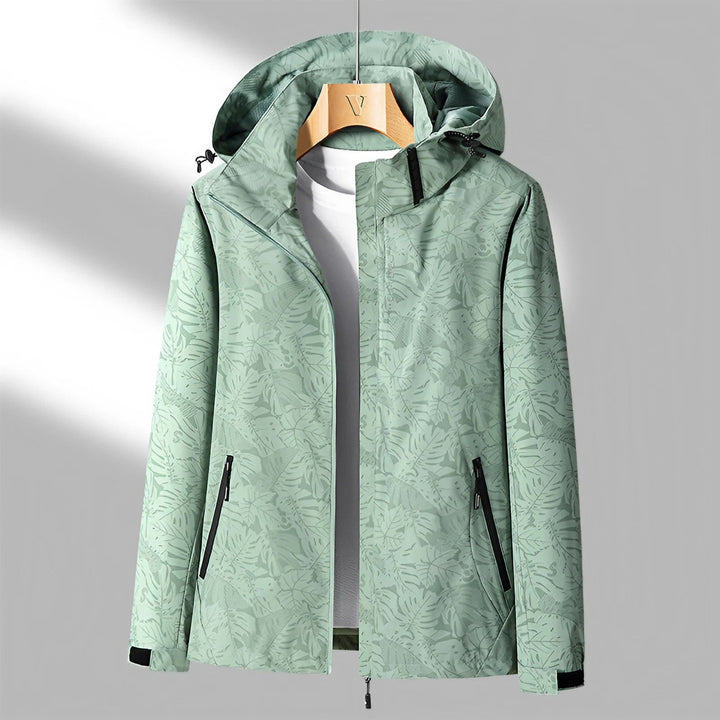 Elegante dames capuchonjas, waterdicht, winddicht, modern ontwerp, ideaal voor regenachtig weer, stijlvolle buitenkleding.