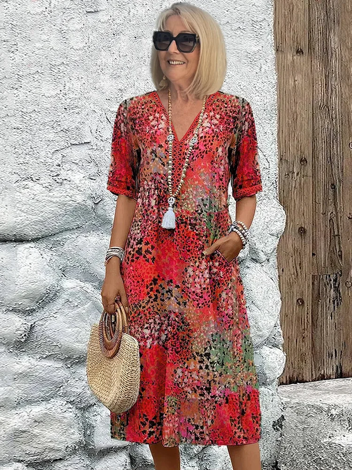Veelzijdige casual/feest dames midi jurk, A-lijn met V-hals en zomerse bloemenprint.