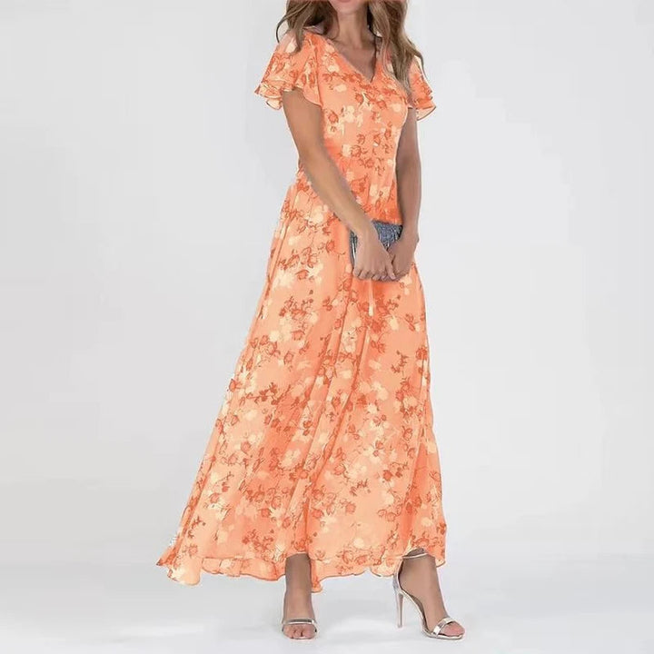 Elegante dames bloemen A-lijn maxi jurk met V-hals en fladdermouwen, ideaal als zomer- of feestjurk.