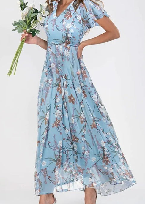 Vrolijke dames bloemen maxi-jurk in A-lijn, perfect als comfortabele zomerjurk, strandjurk of voor een feestje.