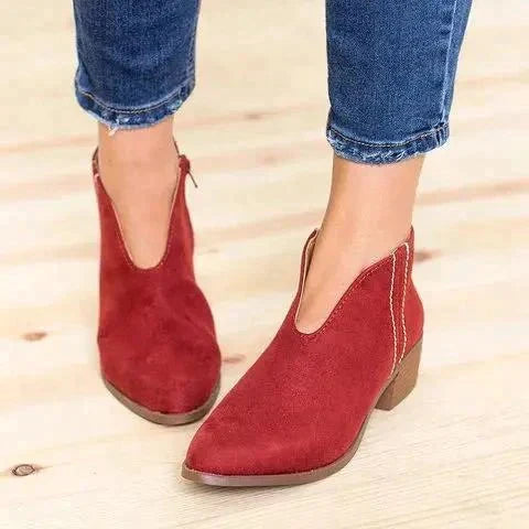 Modieuze dames enkellaarsjes met praktische zijrits en stabiele blokhak, perfect voor een stijlvolle look.