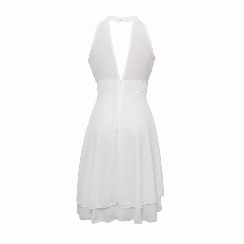Lichtgewicht zomerse halterjurk voor dames. Chiffon midi jurk met hoge taille en flatterende slim fit.