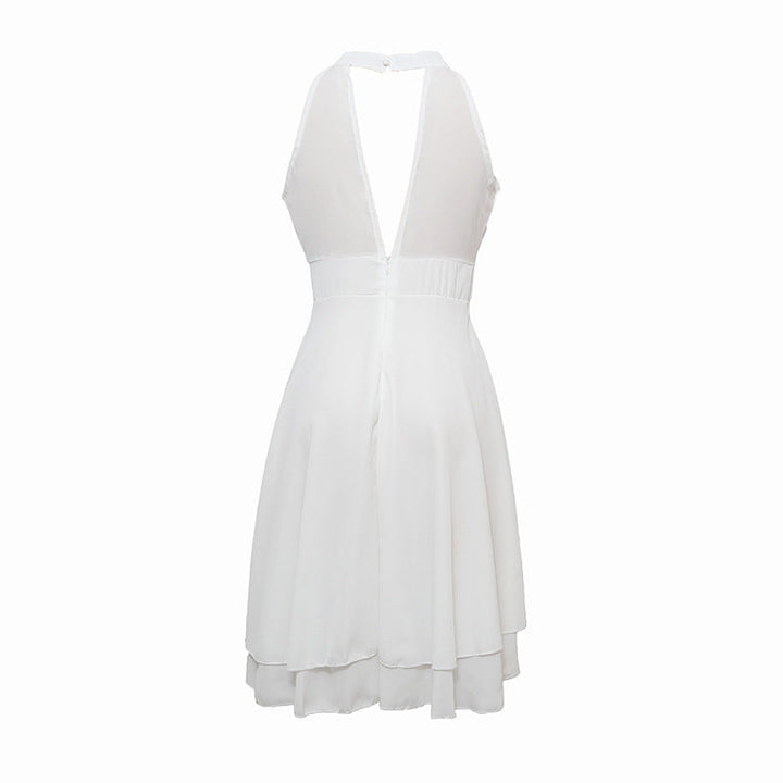 Lichtgewicht zomerse halterjurk voor dames. Chiffon midi jurk met hoge taille en flatterende slim fit.