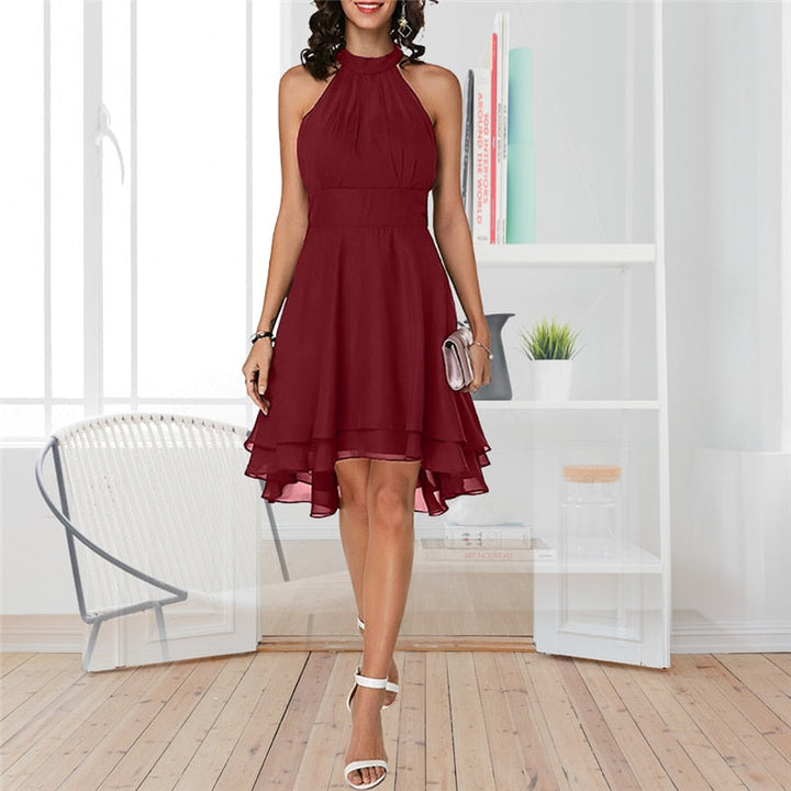 Stijlvolle zomerjurk voor dames: elegante halter midi van chiffon met hoge taille, perfect voor warme dagen.