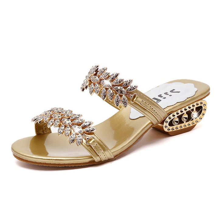 Stijlvolle dames slippers met bling sierstenen; ideale comfortabele zomerschoenen voor elke gelegenheid.