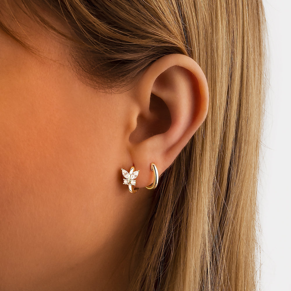 Auryn kristal vlinder hoops, sterling zilveren oorbellen voor dames met gouden accenten en fonkelende kristallen.