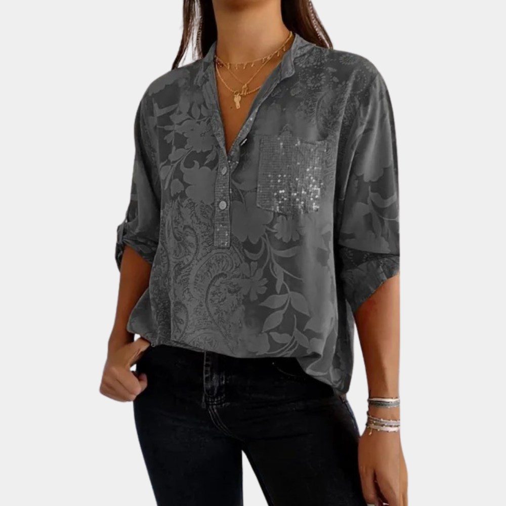 Modieuze dames zomerblouse, casual of elegant te dragen, met handige verstelbare mouwen. Perfecte zomerkleding.