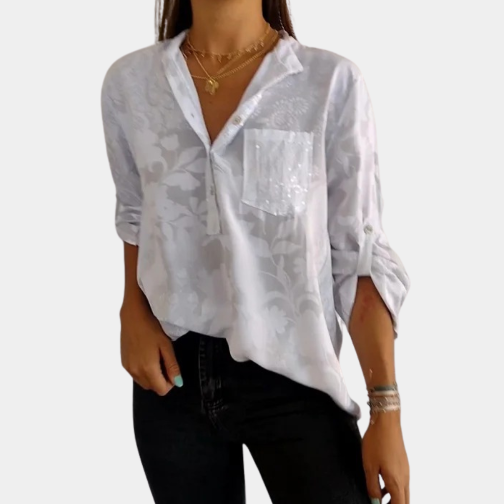 Luchtige lenteblouse voor dames met verstelbare mouwen, ideaal voor een comfortabele en chique zomerse look.