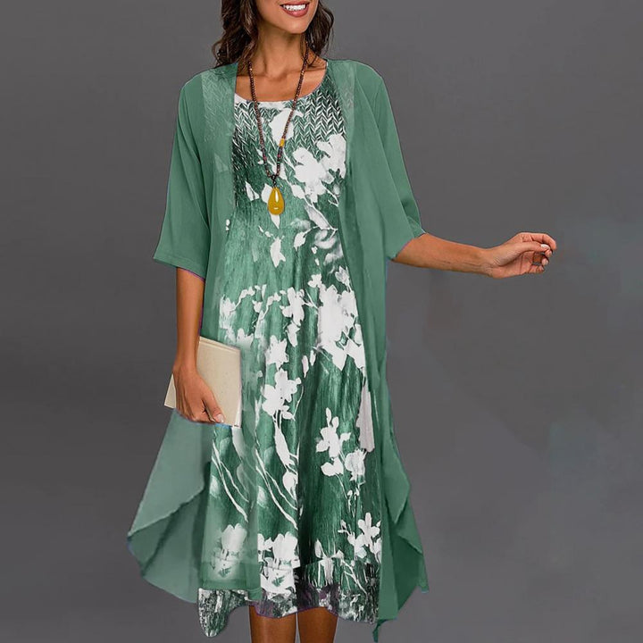 Dames zomerjurk Théa met bloemenprint en lang mouwen vest, een comfortabele tweedelige set voor zomerse mode.