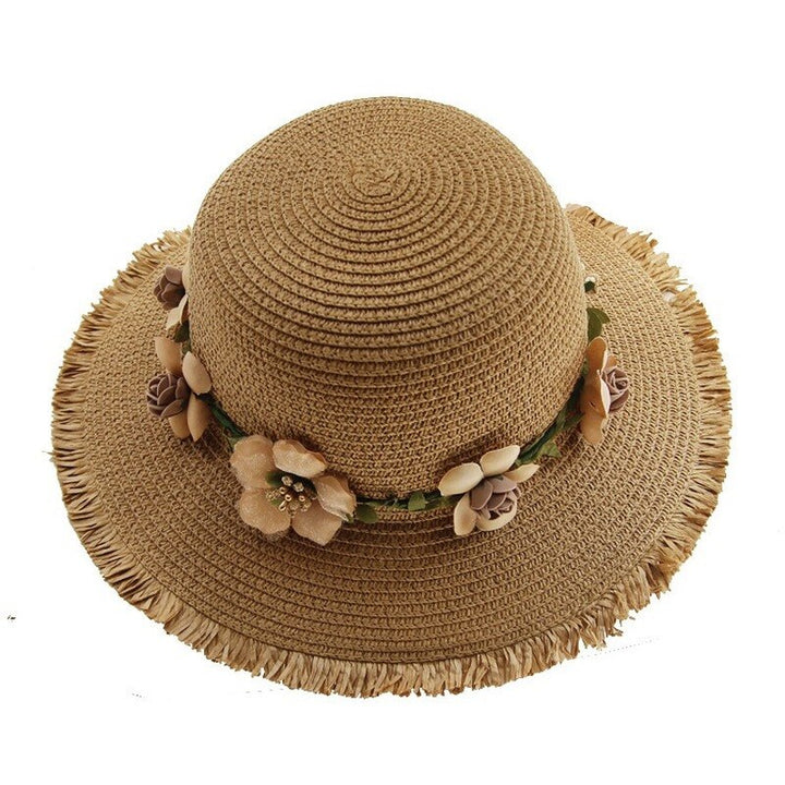 Chique dames zonnehoed met delicate bloemendetails. Een must-have voor zomerse mode en vakanties.
