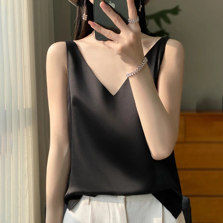 Chique dames top, perfect als feesttop of stijlvolle zomer top. Comfortabele vrouwenmode blouse.