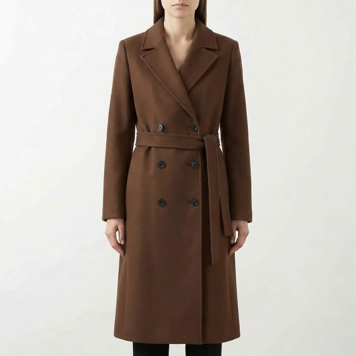 Najaarsjas: elegante lange damesjas, dubbelgebreid met strikceintuur. Perfect als modieuze outerwear.