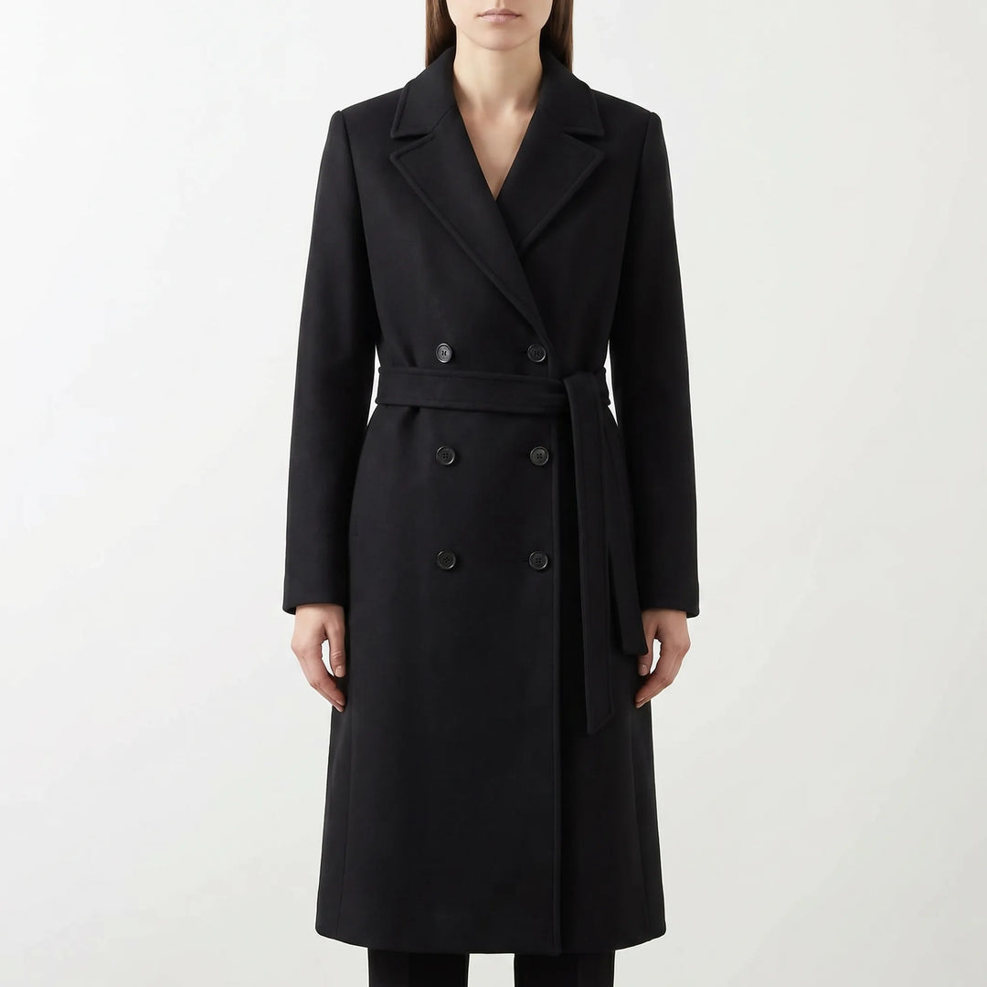 Gestructureerde dubbelgebreide lange damesjas, sophisticated look met strikceintuur. Geschikt voor elke gelegenheid.
