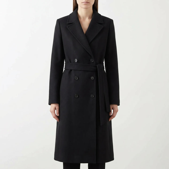 Gestructureerde dubbelgebreide lange damesjas, sophisticated look met strikceintuur. Geschikt voor elke gelegenheid.