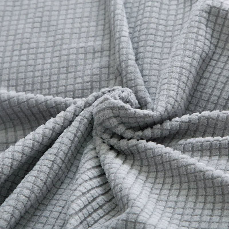 Elegante elastische bankhoes in modern design, past perfect op diverse banken, beschermt tegen slijtage en vlekken.