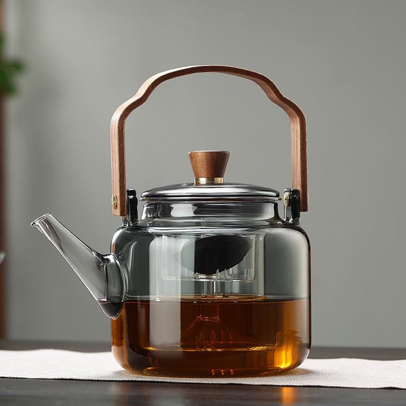 Elegante Grijzen theepot van hout en glas, ideaal voor het theeritueel, met transparant rookglas en een natuurlijke houten accent.