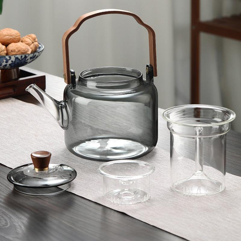 Elegante Grijzen theepot van hout en glas, ideaal voor het theeritueel, met transparant rookglas en een natuurlijke houten accent.