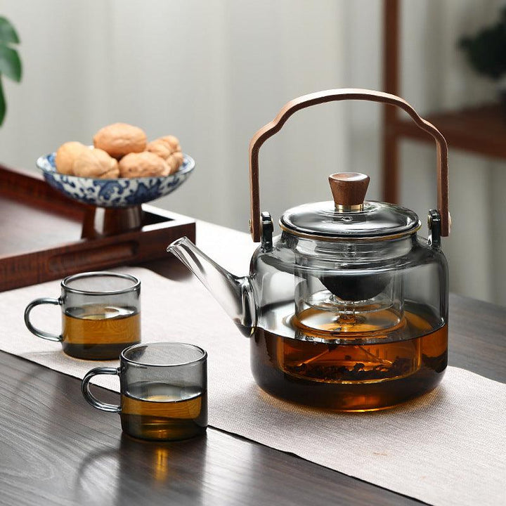 Elegante Grijzen theepot van hout en glas, ideaal voor het theeritueel, met transparant rookglas en een natuurlijke houten accent.