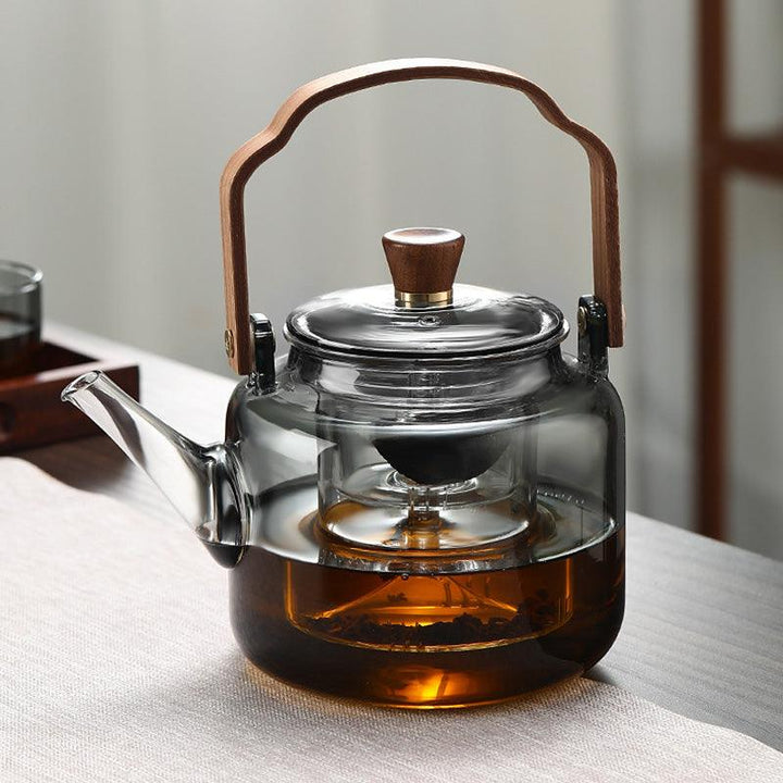Elegante Grijzen theepot van hout en glas, ideaal voor het theeritueel, met transparant rookglas en een natuurlijke houten accent.