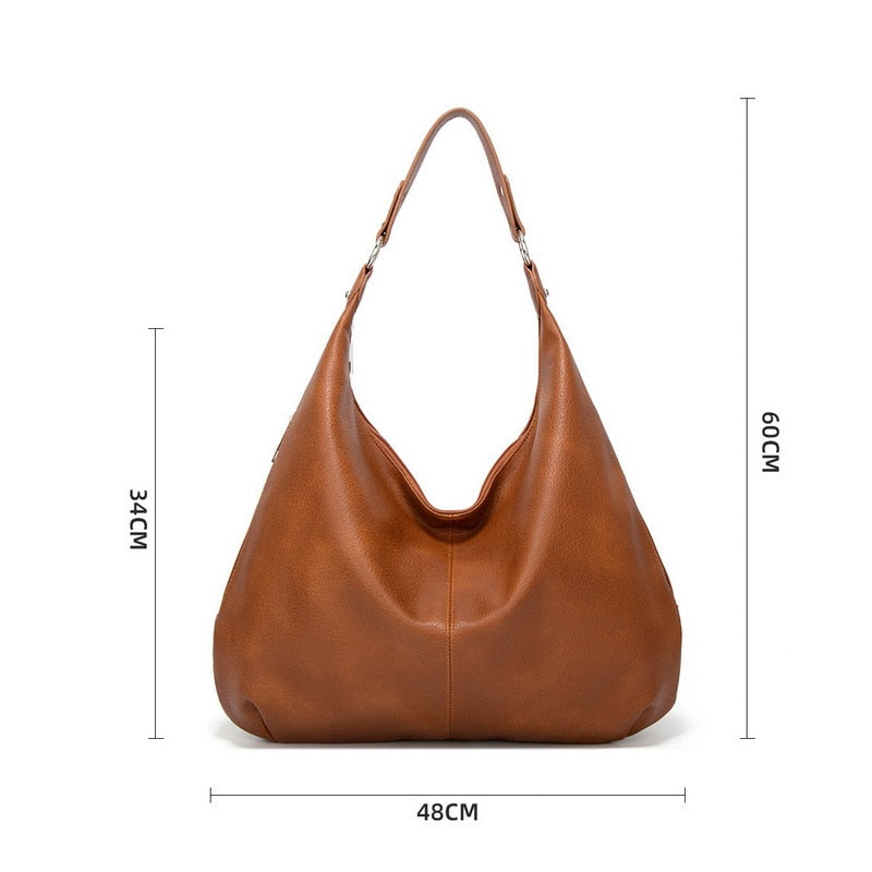 Elegante grote dames schoudertas in verschillende kleuren, tijdloos ontwerp, ruim en met veilige ritssluiting.