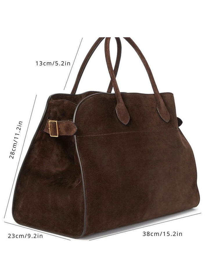 Elegante grote tas van veganistisch leer in zacht beige, ruim en stijlvol voor veelzijdig gebruik.