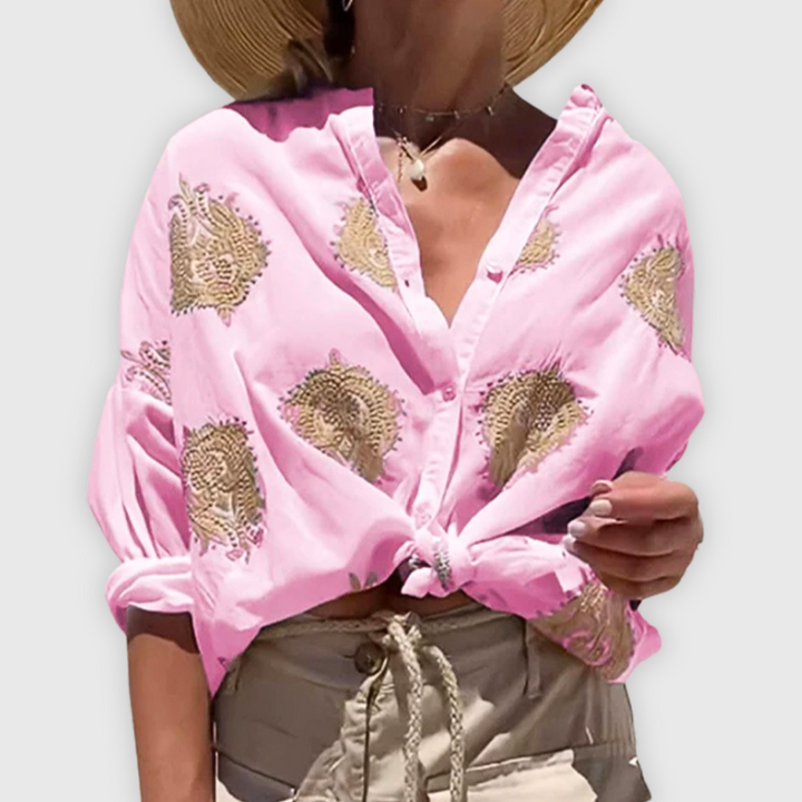 Elegante handgemaakte damesblouse in een tijdloos design, ademend en veelzijdig.