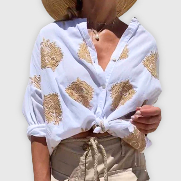 Elegante handgemaakte damesblouse in een tijdloos design, ademend en veelzijdig.