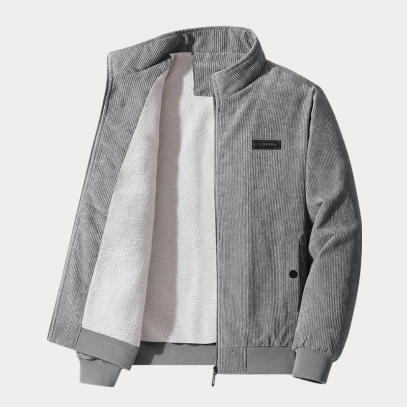 Elegante herenjas met opstaande kraag, modern design en praktische zijzakken, perfect voor koelere dagen.