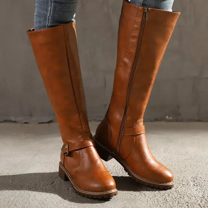 Elegante, kniehoge dameslaarzen van leer met ritssluiting, in het zwart; combineert een stijlvol ontwerp met comfort.