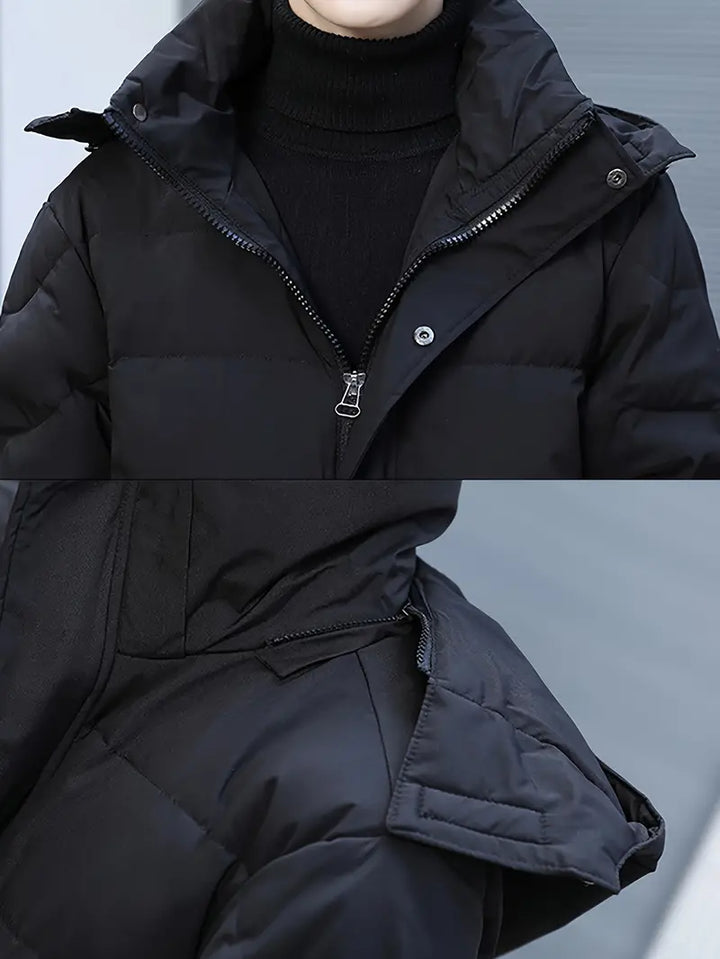 Elegante lange gewatteerde winterjas voor heren met gewatteerd design en optimale weerbescherming voor koude dagen.