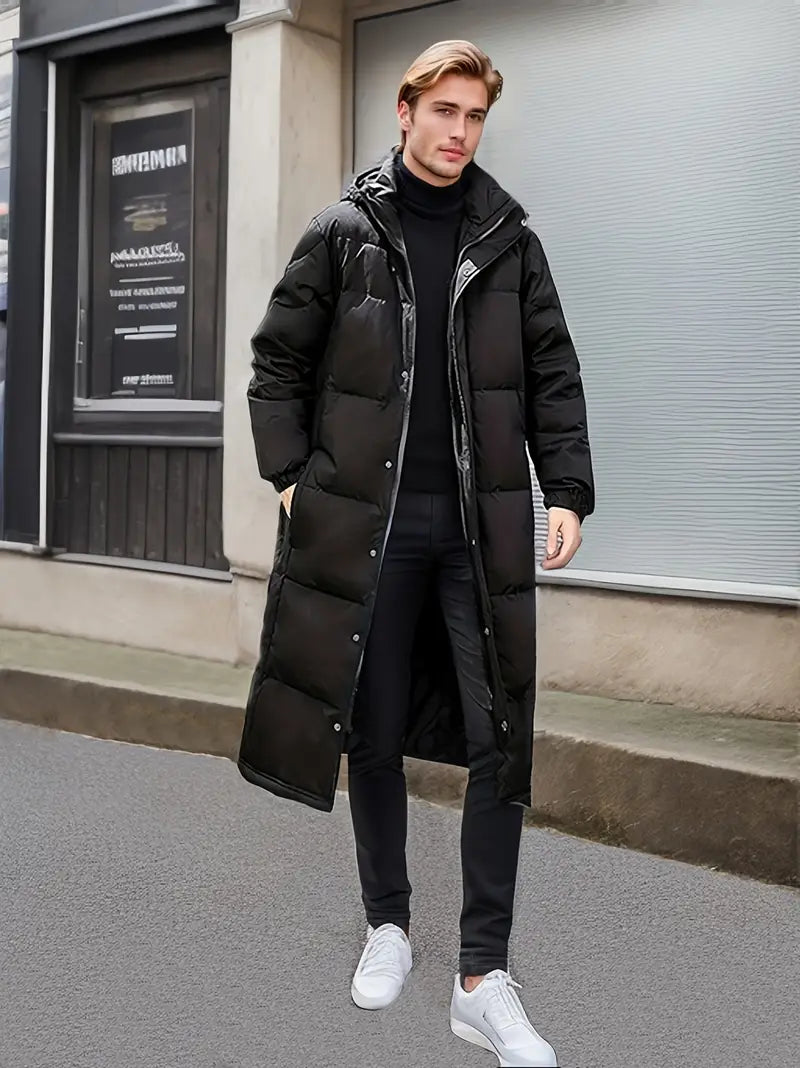 Elegante lange gewatteerde winterjas voor heren met gewatteerd design en optimale weerbescherming voor koude dagen.