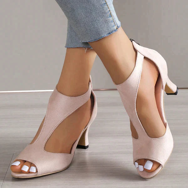 Orthopedische zwarte high heels met een brede hak van 4 cm voor maximaal draagcomfort en stijl.