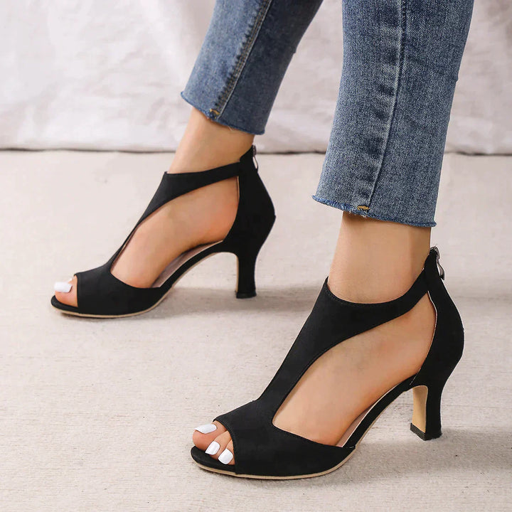 Orthopedische zwarte high heels met een brede hak van 4 cm voor maximaal draagcomfort en stijl.